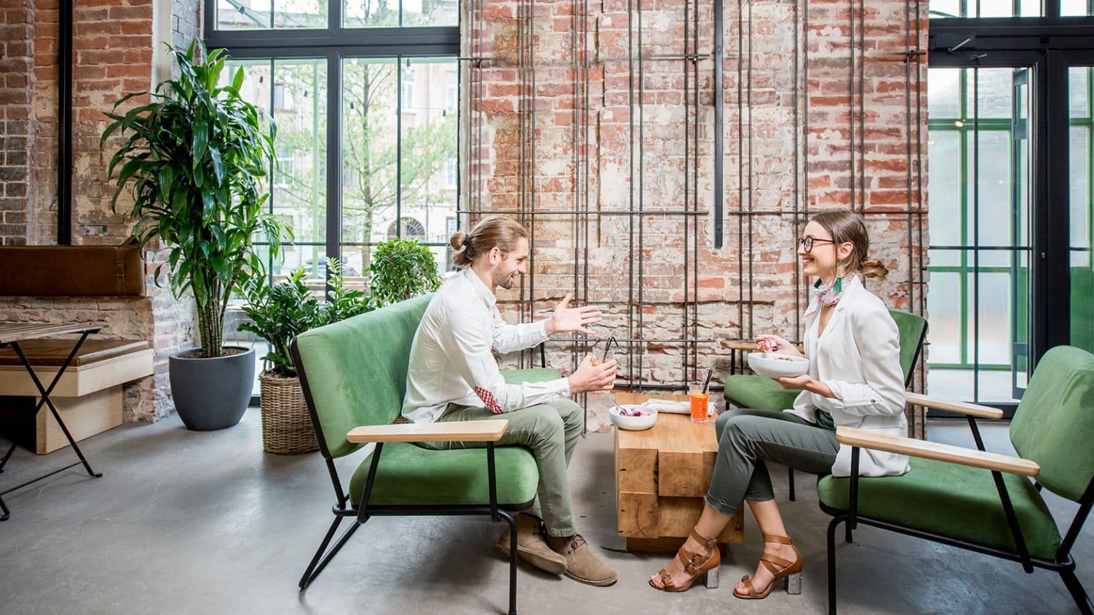 Business people during a lunch at the loft interior