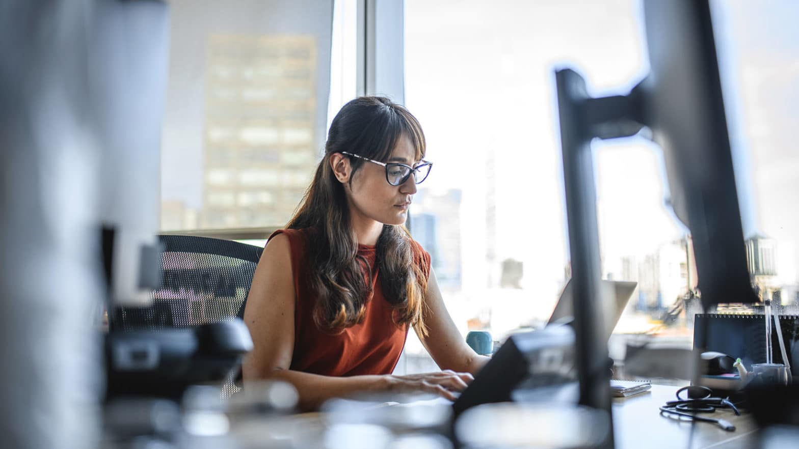 Businesswoman Working on Laptop