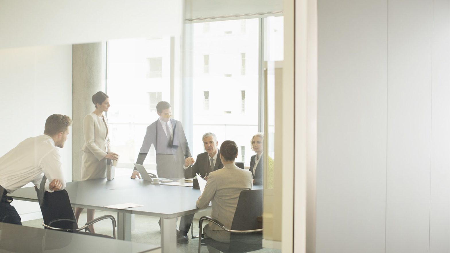 Colleagues working in boardroom